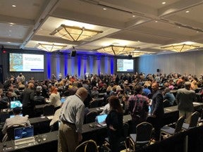 Photo of a full conference room at IUG 2024